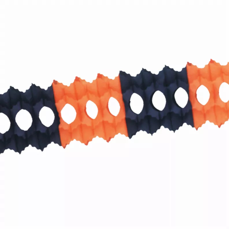 Orange, navy and white tissue garland with scalloped pennants and oval cutouts