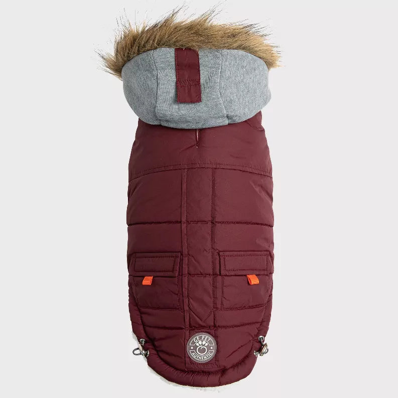 Maroon winter sailor dog parka with gray fur hood, back quilting, and front pockets
