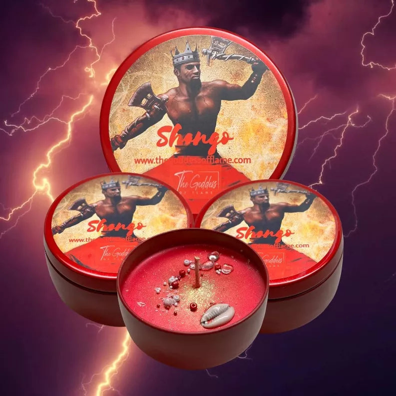 Three round candle tins with graphic lids and red wax top in the front