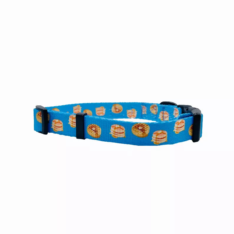 Blue dog collar with repeating hamburger print and black adjustable hardware