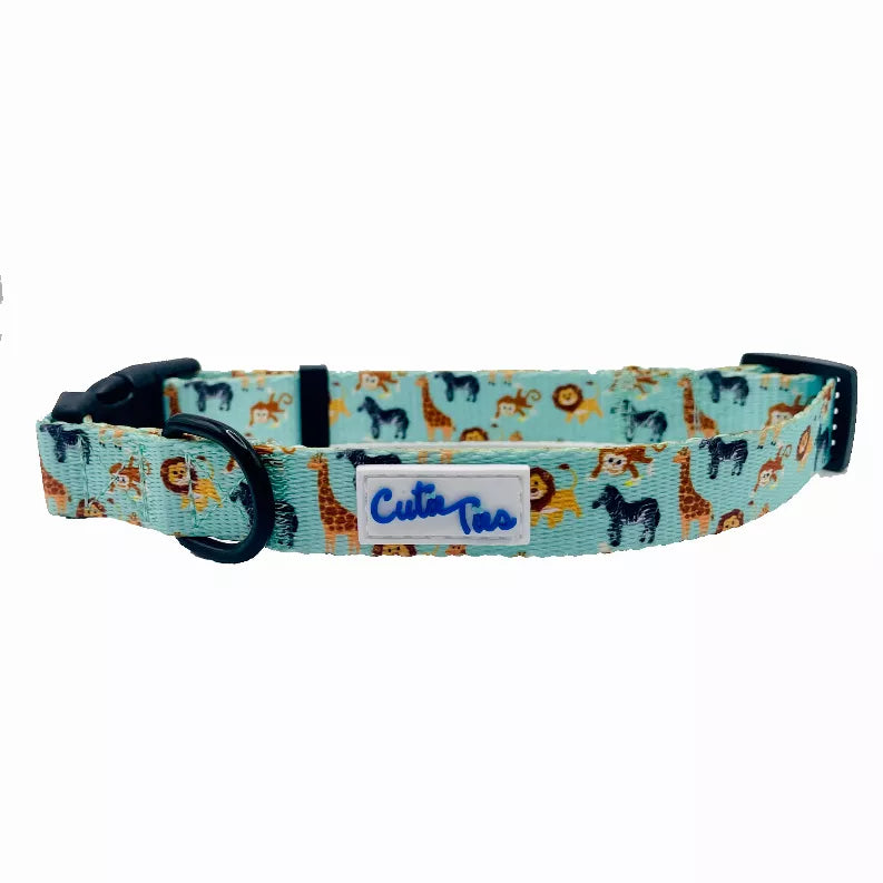 Turquoise dog collar with navy buckle and centered logo label, jungle animal print