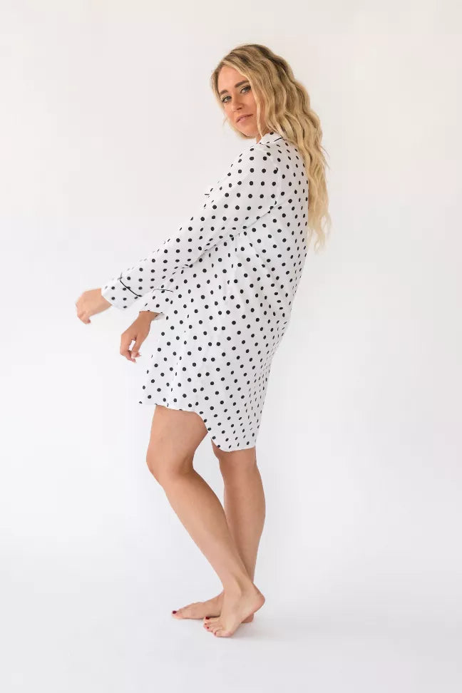 Women's polka-dot night shirt, side view with long sleeves and button-front, white with black dots