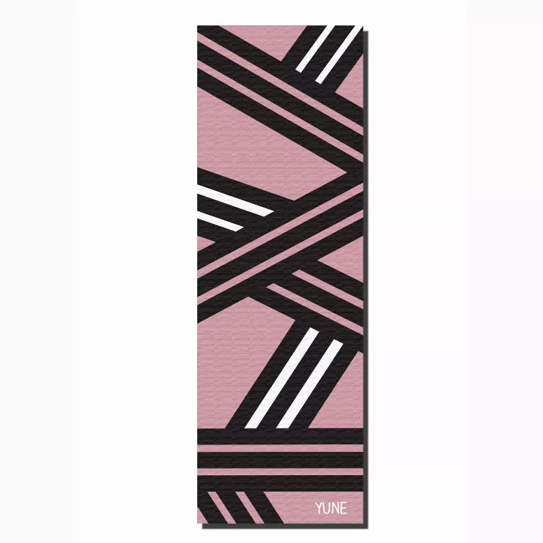 Yoga mat with pink and black diagonal stripe design, YUNE logo on lower border
