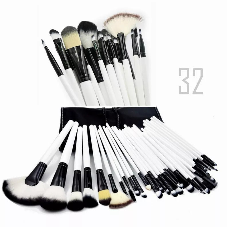 Wooden makeup brush set with black handles, mixed bristles, and white storage pouch