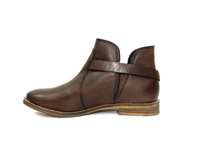 Dark brown ankle bootie with wide topline strap and stitching panels, low stacked heel