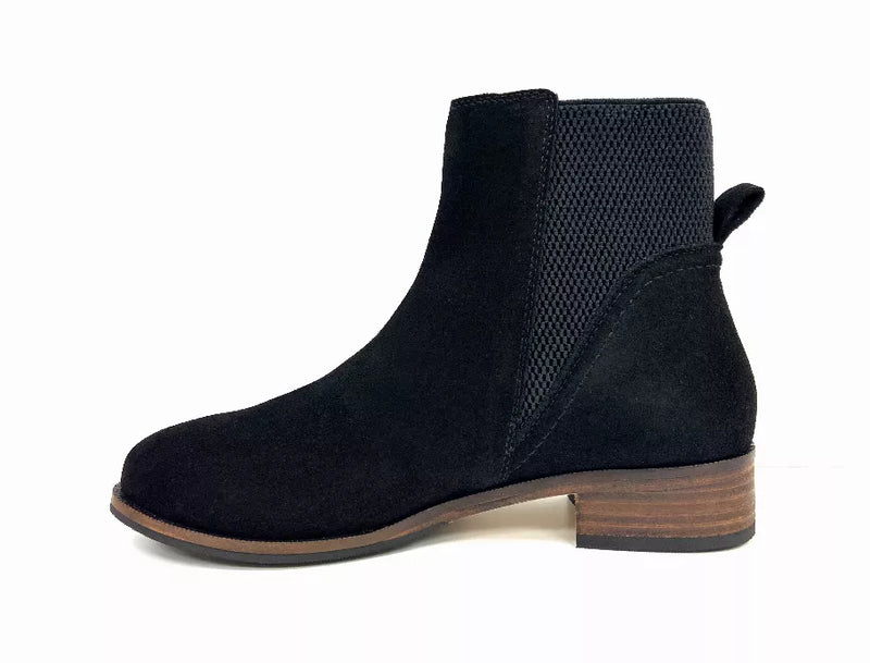 Black suede Chelsea boot with elastic gore and low wood block heel.