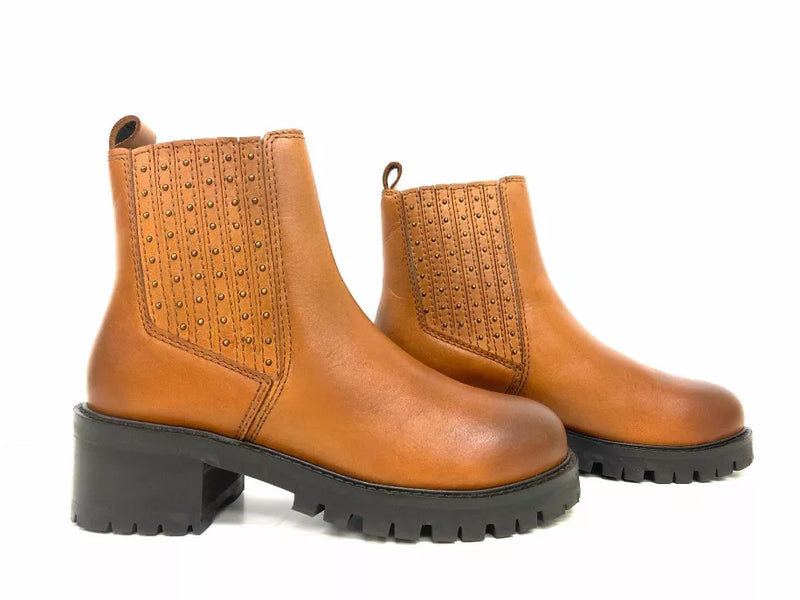 Tan studded Chelsea boots, side elastic panels, chunky platform heel with black tread sole