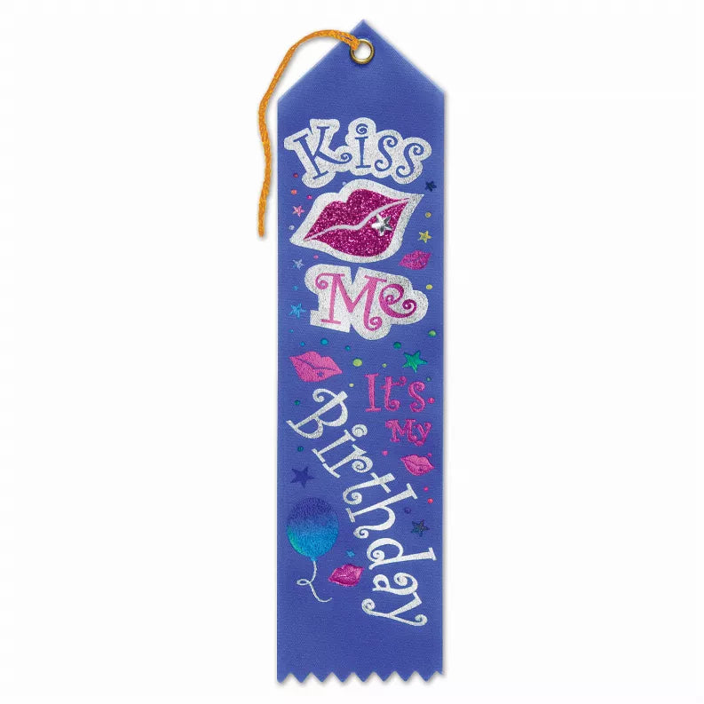 Blue award ribbon with pink “Kiss Me” and birthday message