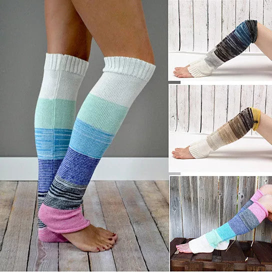 Multi-color winter socks with striped blue, teal, navy and pink accents; crew height.