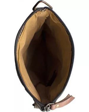 Open crossbody bag interior with tan lining and dark trim around the top opening