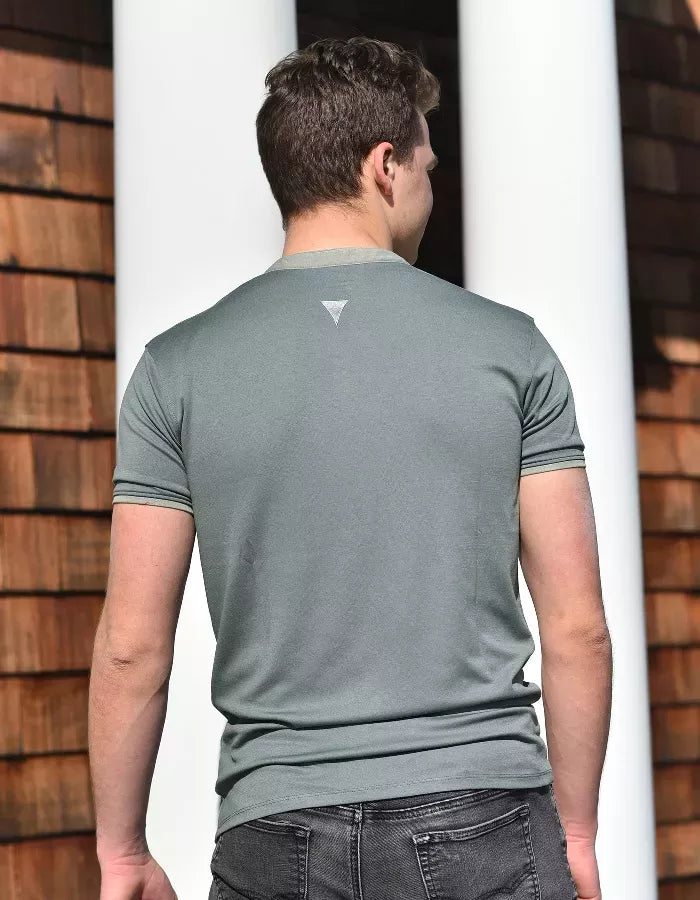 Green short-sleeve polo shirt back view with collar seam