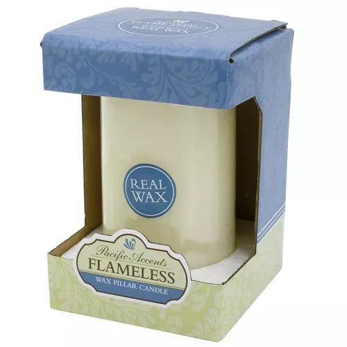 Ivory flameless pillar candle shown in blue patterned packaging, Real Wax label