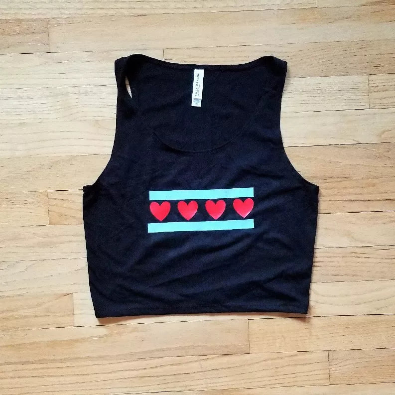 Dark crop top, sleeveless scoop neck, heart flag graphic across chest
