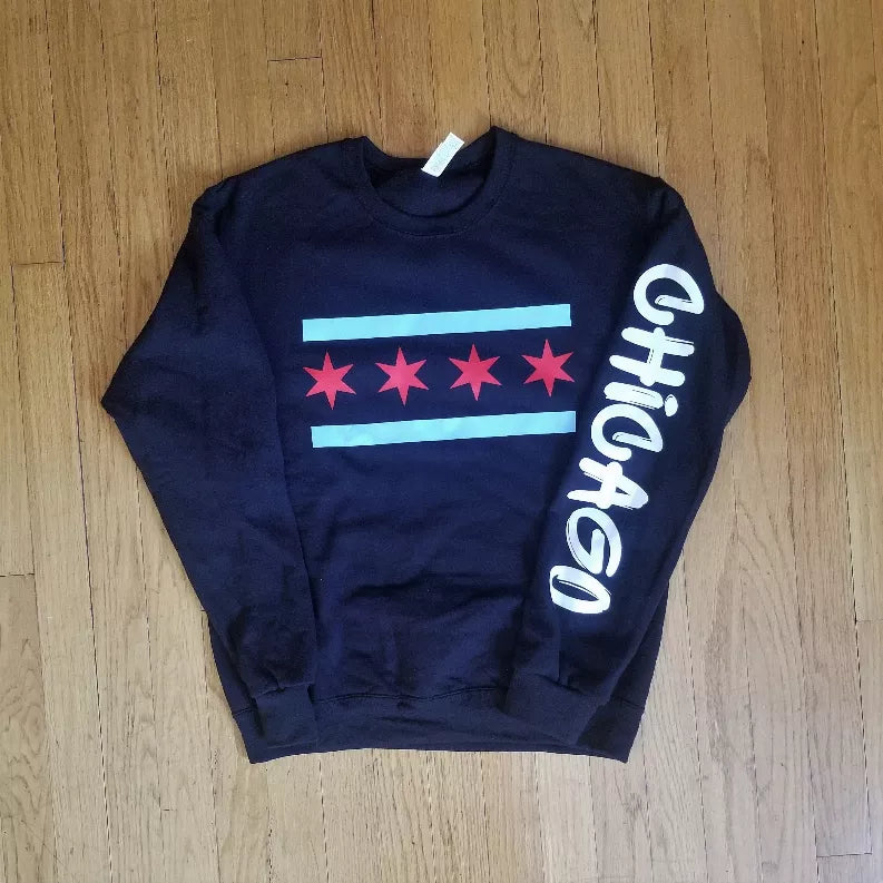 Navy crewneck sweatshirt with flag graphic, red stars, blue stripe, and white side lettering