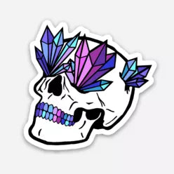 Crystal skull sticker close-up, purple and blue crystal shapes on white skull, white border