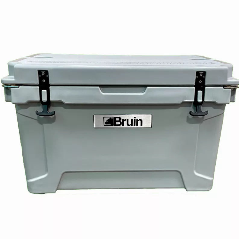 Gray roto-molded cooler with two black front latches and Bruin badge