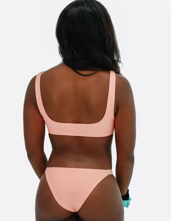 Peach bikini top with wide scoop back and thin shoulder straps