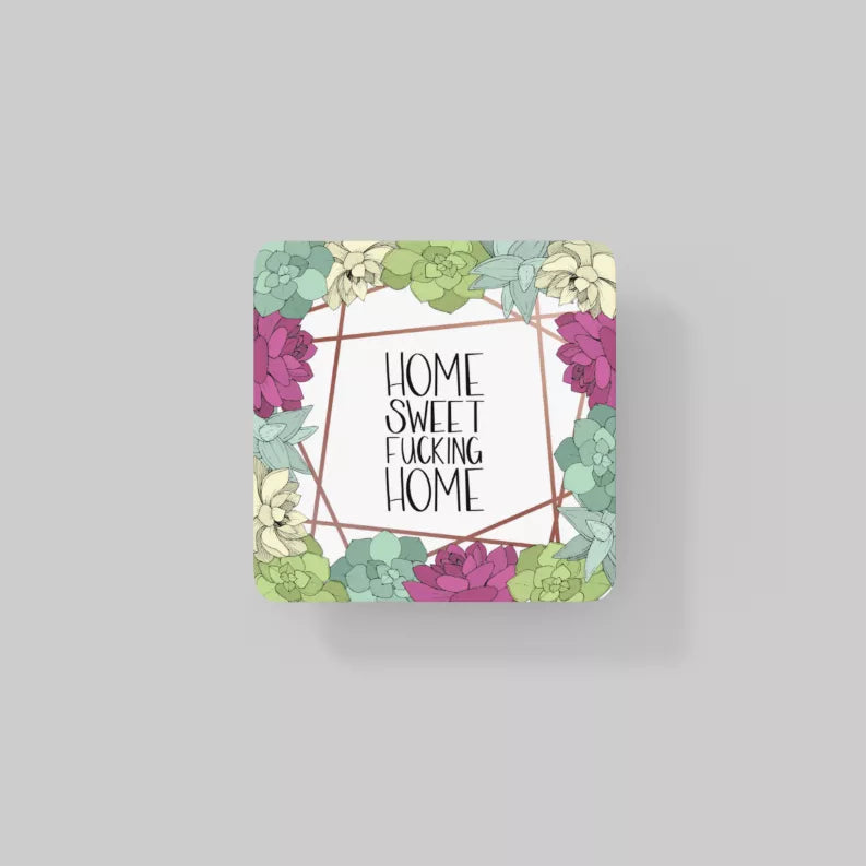 Coaster set: rounded-square coaster with multicolor floral frame and “HOME SWEET FUCKING HOME”.