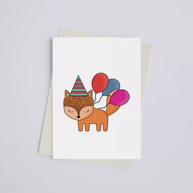 Birthday greeting card with a cartoon fox holding red, blue, and pink balloons