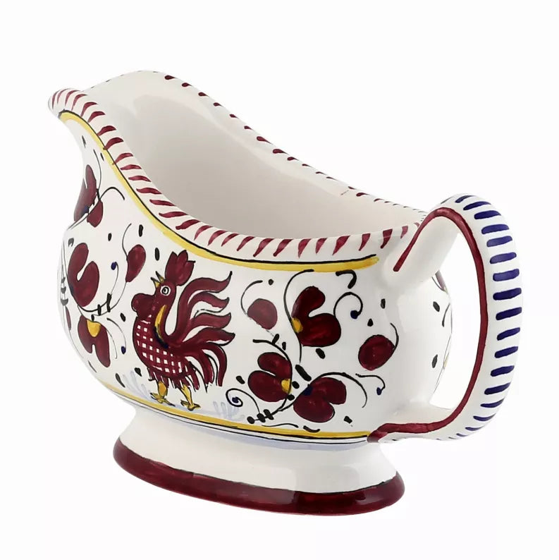 Deruta-style ceramic sauce boat with red floral rooster design and loop handle