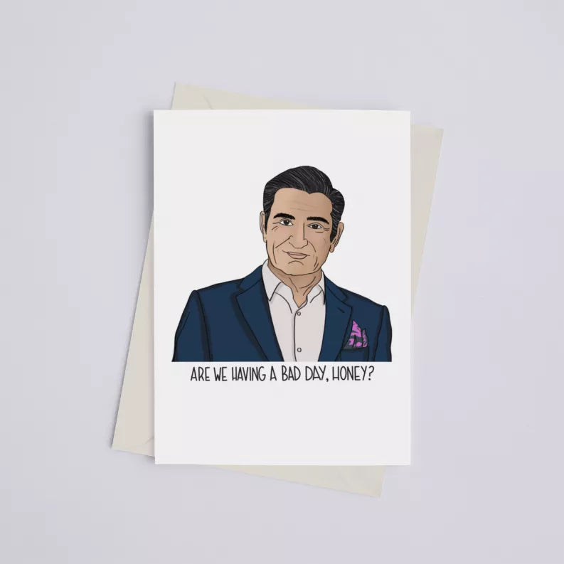 Greeting card with man in blue suit and quote 'Are we having a bad day, honey?'