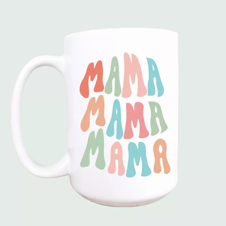 White ceramic coffee mug with colorful 'MAMA' letter art