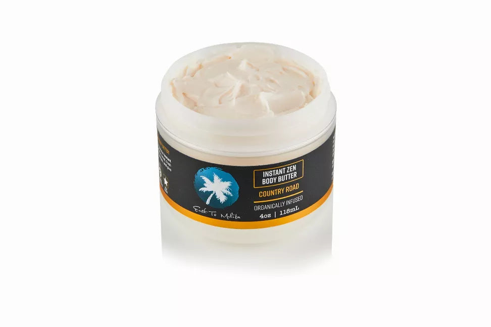 Country road body butter jar with beige cream and orange label