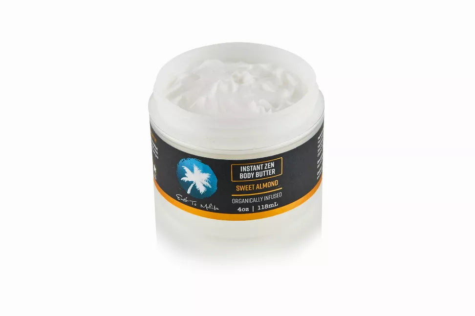 Sweet almond body butter jar with white cream and orange label, front view
