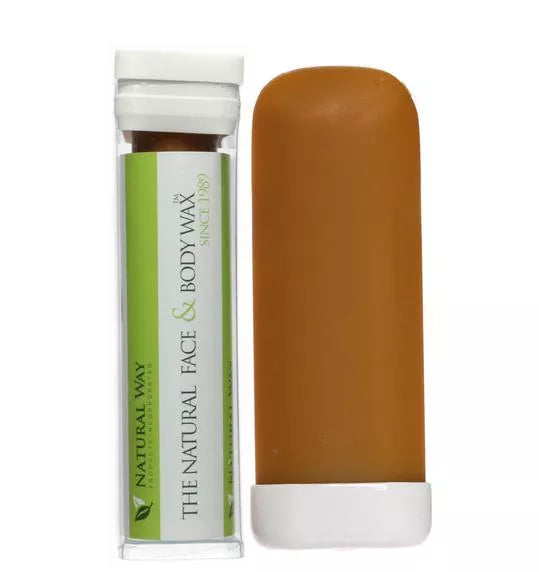 Hard wax body stick with amber wax in clear applicator container