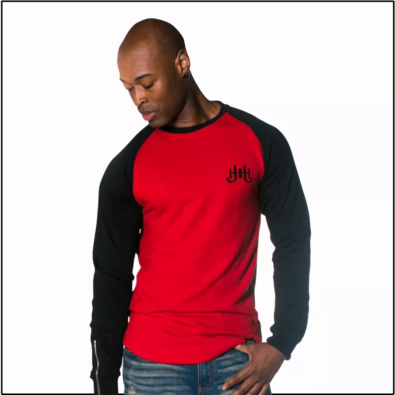 Red front raglan sweatshirt with black sleeves and small chest logo