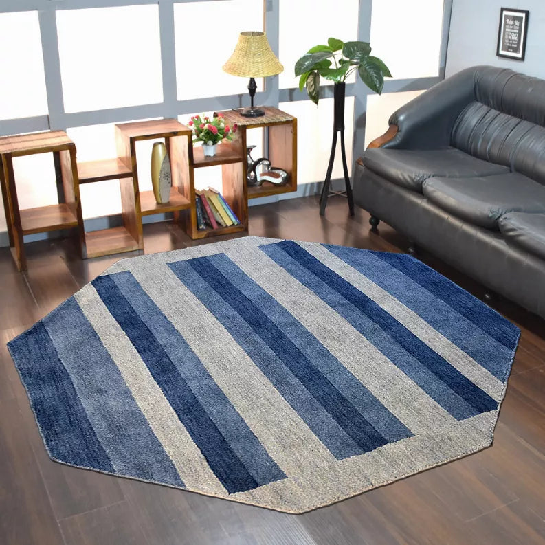 Blue and gray striped octagon wool area rug with flat woven pile and border edges