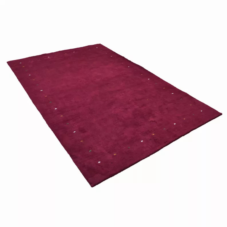 Maroon speckled area rug, rectangular, laid flat on a light background