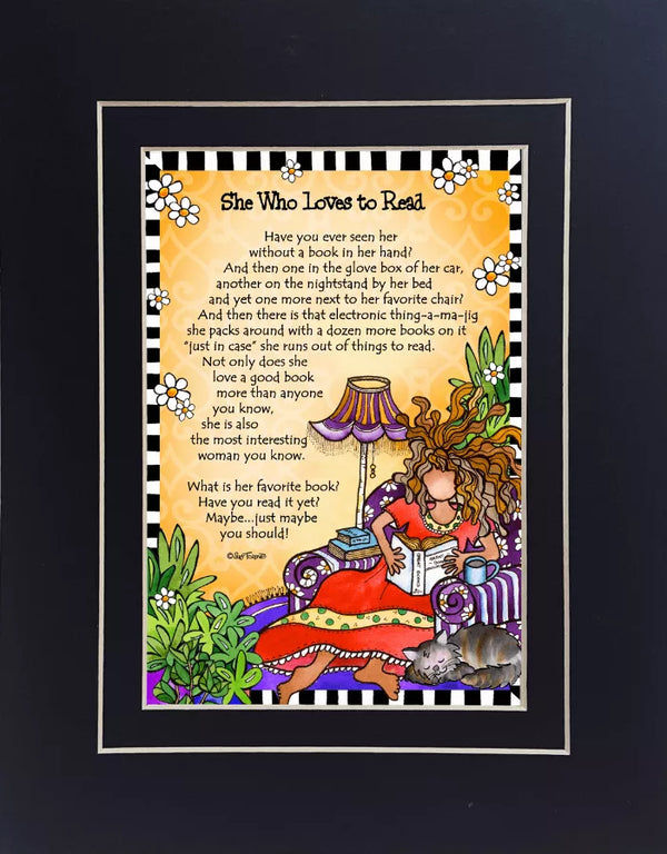 Framed cartoon quote art with colorful woman and cat, reads 'She Who Loves to Read'