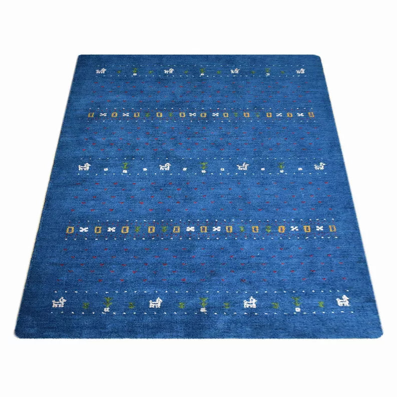 Blue contemporary area rug with rows of small multicolor icons across the surface