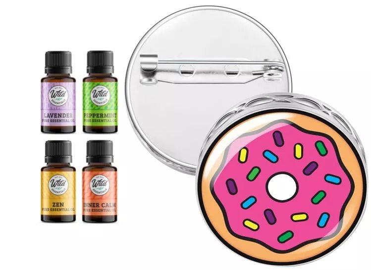 Frosted donut pin brooch diffuser with round enamel-style face and four oil bottles