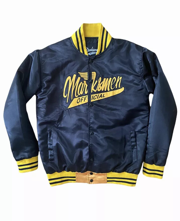 Dark navy silk satin bomber jacket with yellow ribbed cuffs, front graphic patch, rib trim hem
