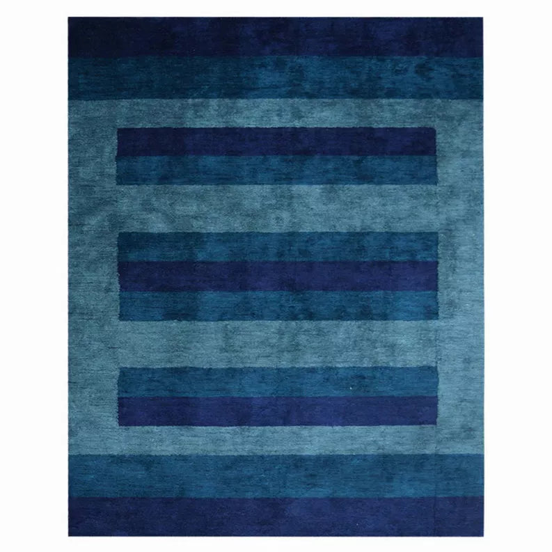 Contemporary area rug with teal and dark blue horizontal stripe pattern