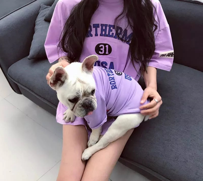 Lavender matching T-shirt set for pet and owner, graphic front; dog and person shown.