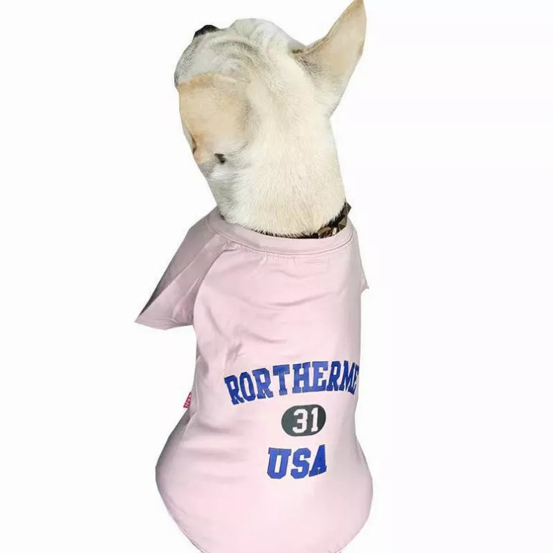 Light pink pet shirt with short sleeves and blue 'USA' print, number 31