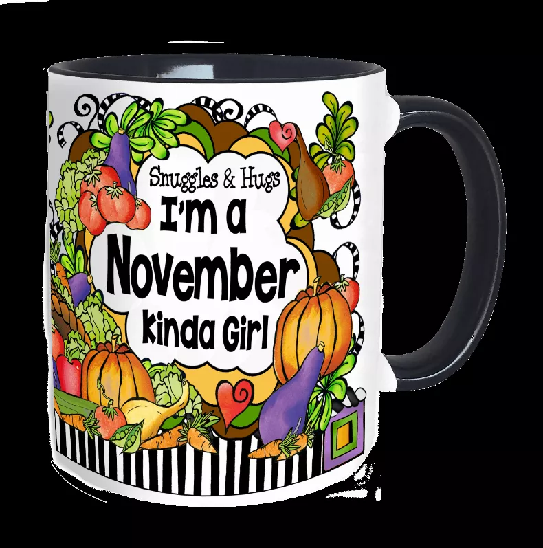 November ceramic mug with colorful autumn illustration and 'I'm a November kinda girl' text