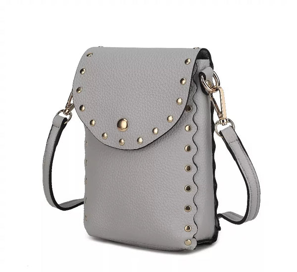 Women's vegan leather crossbody bag with studded flap and adjustable shoulder strap