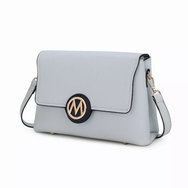 Light gray crossbody bag with front flap and circular logo, adjustable shoulder strap.