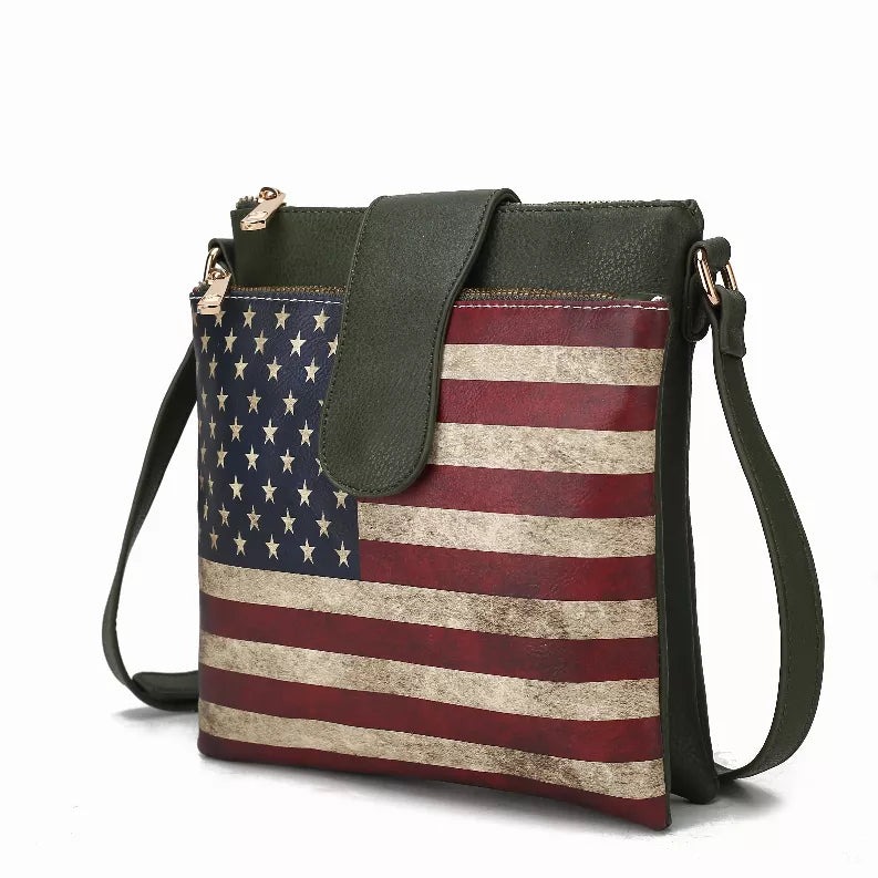 Green vegan leather crossbody bag with American flag print, top zip, and long strap