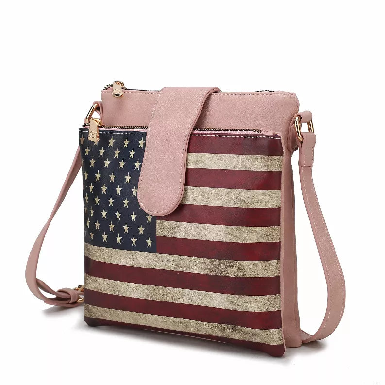 Vegan leather crossbody bag with U.S. flag print, blush pink trim, adjustable strap