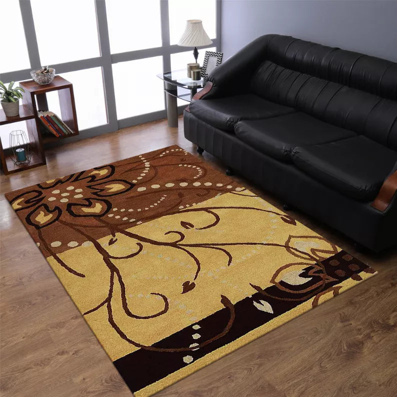 Floral hand-tufted wool area rug on floor, beige with brown floral scroll pattern