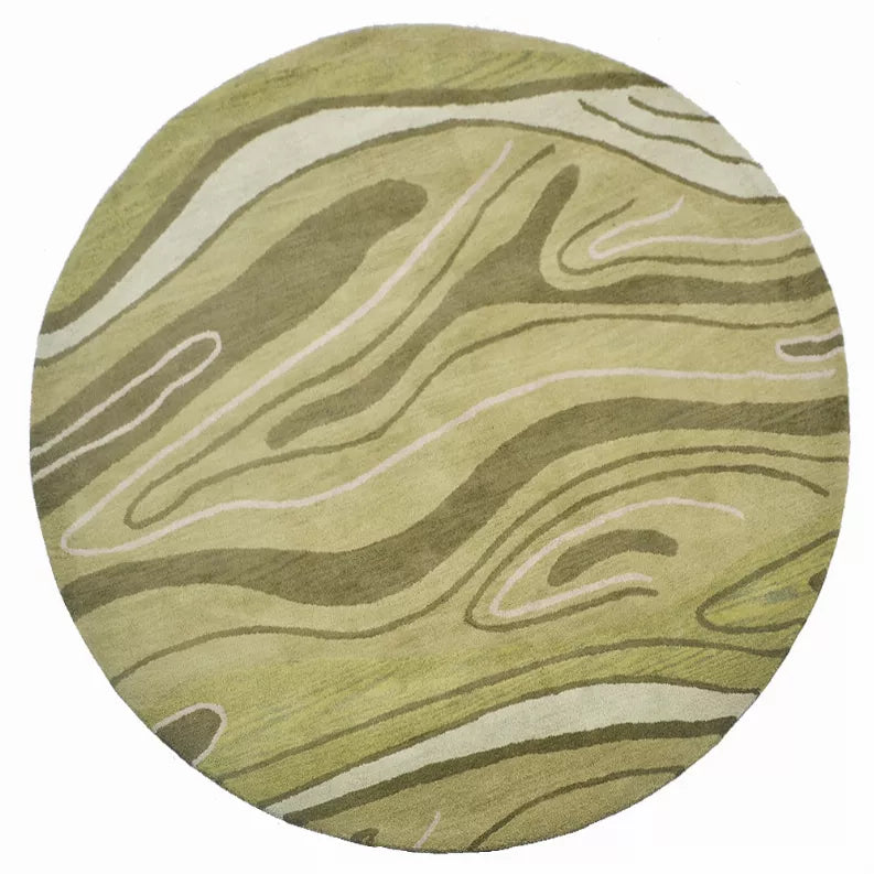 Round wool area rug with abstract olive, sage, and beige wavy stripes; close view.