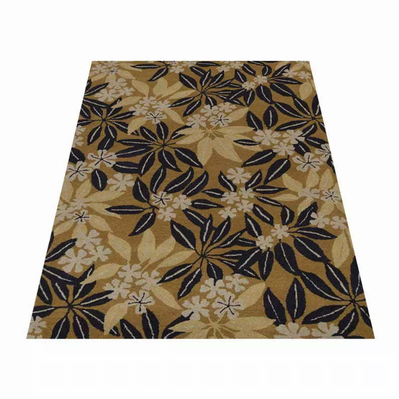 Hand-tufted wool floral area rug with beige base and dark navy floral and leaf motifs