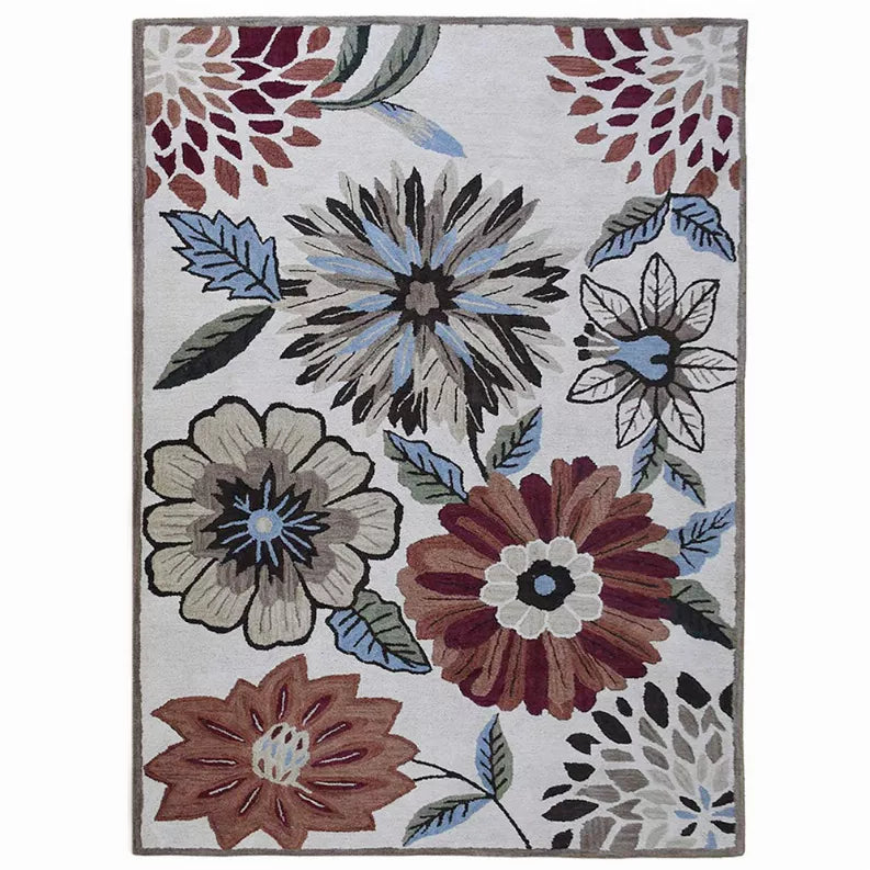 Floral area rug with multicolor flowers and leaf outlines on light ground