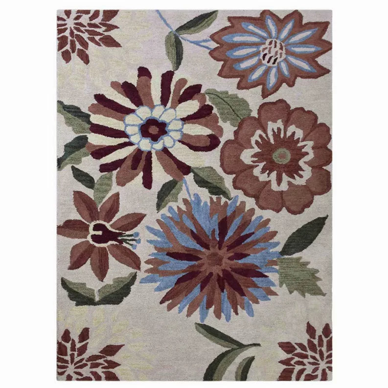 Hand-tufted shag area rug with multicolor floral medallions on light background