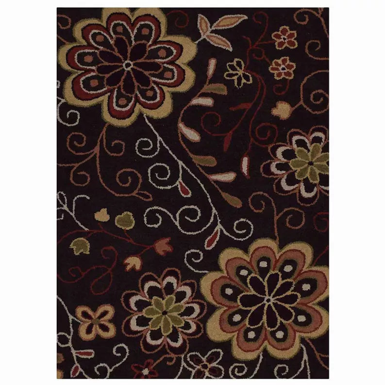 Floral hand-tufted wool area rug with dark brown background and multicolor flower pattern